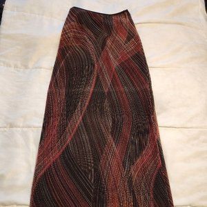 Dress Pleaded Skirt with a Swirl Design